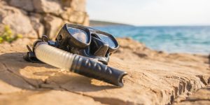 ScubaAroundTheWorld.com - best snorkel gear reviews - mask and snorkel by the sea